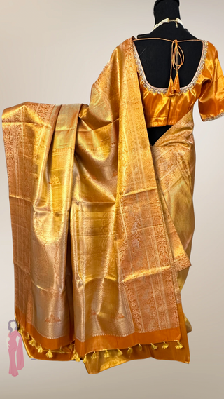 Yellowish Orange color vaira oosi silver zari Pure KANJIVARAM SAREE with Hand embroidered blouse Meenakari borders