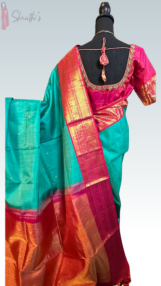 Elegant Shade of Teal and Pink Vaira Oosi Kanchivaram silk saree with soft drape, rich zari border, and prestitched blouse, ideal for bridal wear.