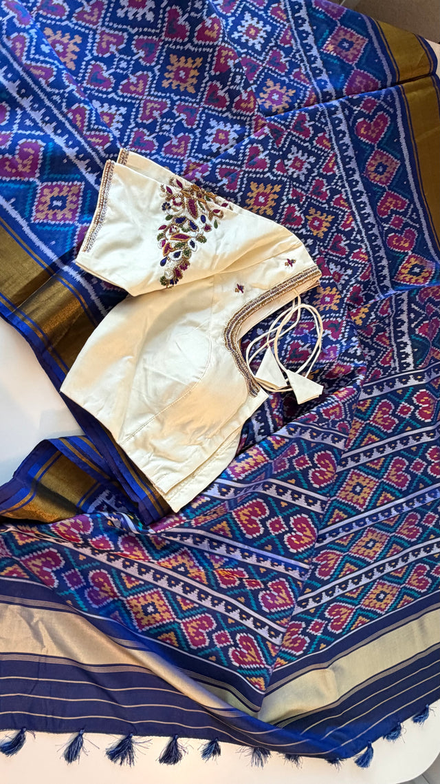 Handloom indigo blue patola pure silk saree showcasing intricate traditional patterns