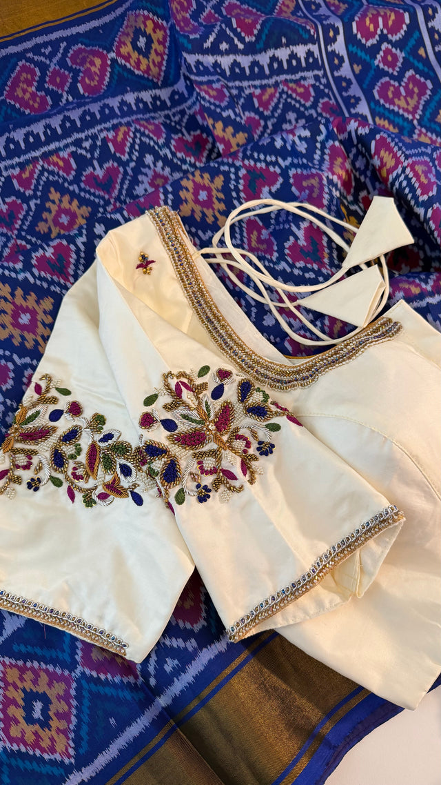 Indigo blue patola silk saree with gold silk finish pallu and premium drape