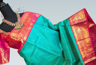 Ikat silk prestitched blouse in coordinated pink shade paired with Kanchivaram saree, size adjustable from 36 to 42.