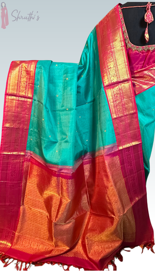 Double-shaded pink and teal Kanjivaram silk saree with silver zari and fine vaira oosi weave, pure handloom bridal silk saree.