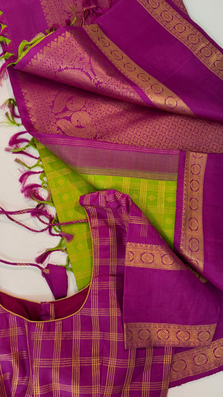 Green kanchi pattusaree with purple embossed zari  blouse