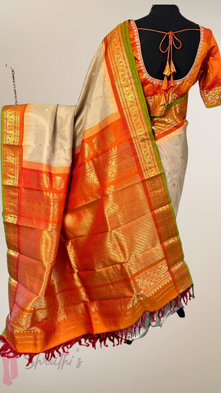 Ven Pattu Beige Orange Gadwal handwoven silk saree with Embroidered stitched blouse
