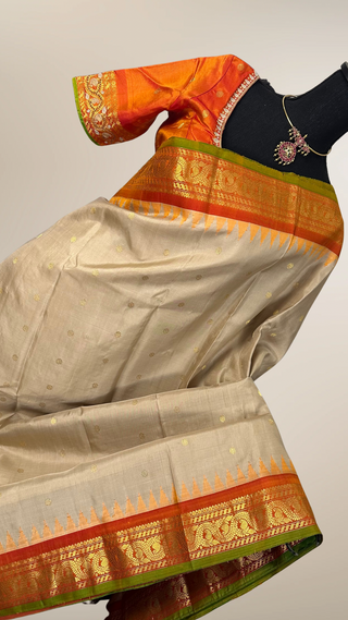 Ven Pattu Beige Orange Gadwal handwoven silk saree with Embroidered stitched blouse