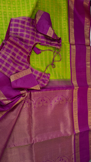 Green kanchi pattusaree with purple embossed zari  blouse