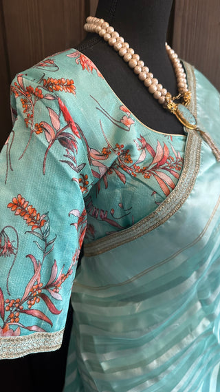 Pastel blue Organza soft weave gold borders with stitched blouse