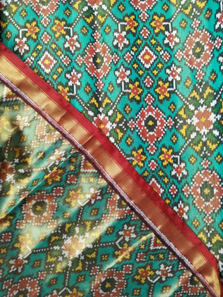 Orange Tissue twill Handloom pure silk Patan patola silk saree can be worn both sides two  pallu double threaded saree with stitched  blouse