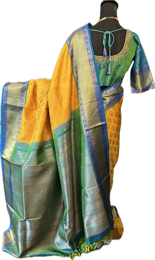Yellow pure zari  kanjivaram silk saree blouse embroidered blouse