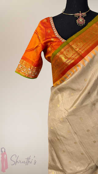 Ven Pattu Beige Orange Gadwal handwoven silk saree with Embroidered stitched blouse