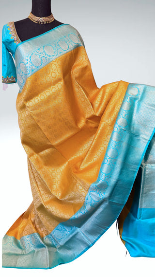 Brocade kanjivaram yellow gold zari with stitched blouse traditional kanchi pattusaree saree Indian wedding