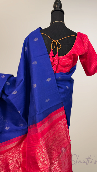Pure Blue Raw silk saree with silver motifs  with printed blouse contrast blouse