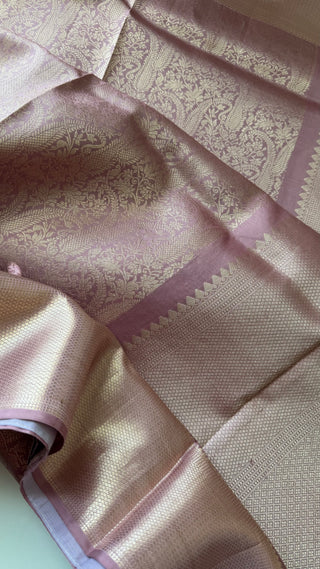 Pastel mauve silver zari kanjivaram silver zari with stitched blouse.
