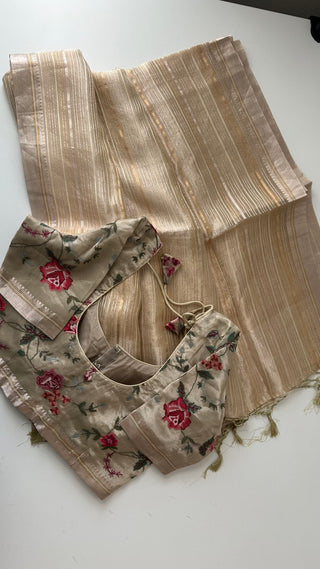 Benaras tissue organza saree with lined, padded, prestitched blouse included.