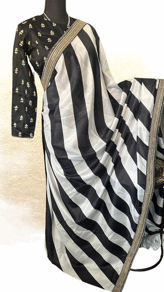 Black and white silk partywear saree with floral embroidery border