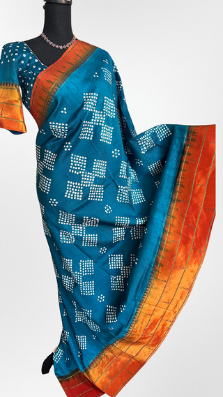 Handloom Blue Green Bandhani Paithani silk saree with copper zari detailing and stitched blouse, perfect for festive and wedding occasions.