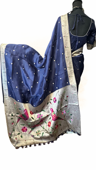 Soft organza saree featuring silver paithani style borders