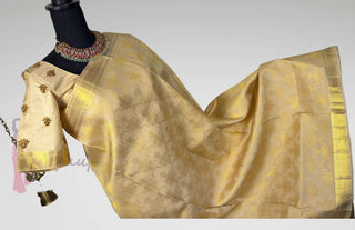 Bridal gold brocade Kanjivaram silk saree with pure zari borders and embroidered stitched blouse for Indian wedding muhurtam saree