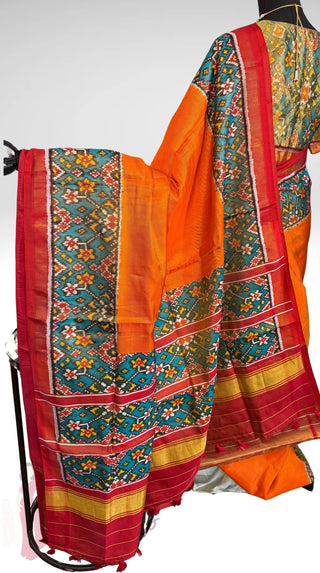 Orange Tissue twill Handloom pure silk Patan patola silk saree can be worn both sides two  pallu double threaded saree with stitched  blouse