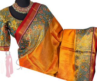 Orange Tissue twill Handloom pure silk Patan patola silk saree can be worn both sides two  pallu double threaded saree with stitched  blouse