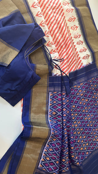 Orange pure ikat silk saree with prestitched blouse pett border