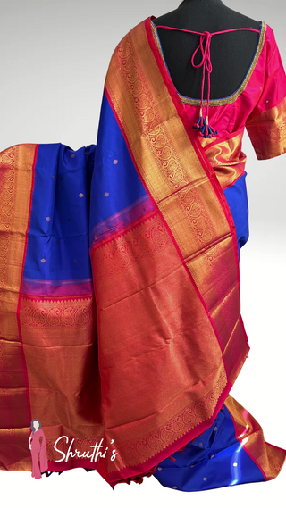 Elegant bridal silk saree with zari details and easy drape design.