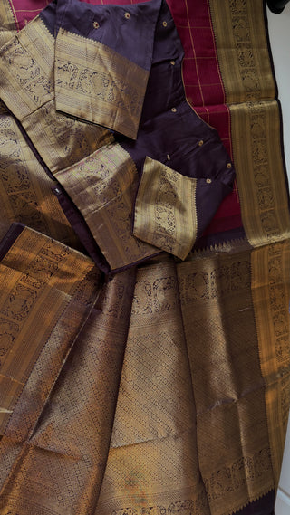 Classic maroon Kanchipuram silk saree with muthu kattam check pattern