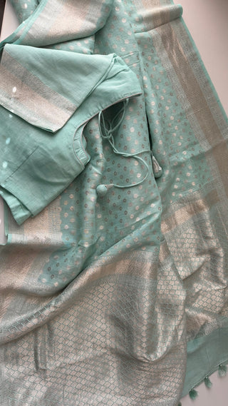 Designer pastel cyan linen saree with silver zari border and lined padded blouse