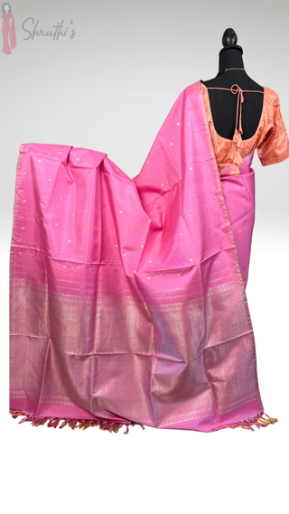 Designer pastel pink Kanjivaram silk saree with fine handwoven silver zari