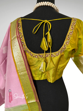 Designer pastel pink Kanjivaram silk saree with contrast green zari border reception saree USA.
