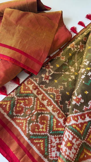 Handcrafted Patan Patola saree featuring detailed ikat weaving, silk finish texture, and pre-stitched blouse with embroidery for a refined ethnic look.