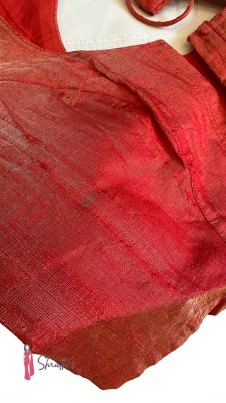 Rich shimmering tissue fabric in premium red blouse