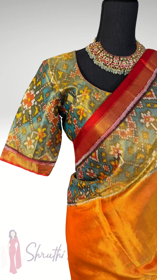 Orange Tissue twill Handloom pure silk Patan patola silk saree can be worn both sides two  pallu double threaded saree with stitched  blouse