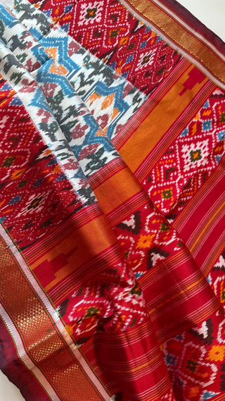 White  pure pochampalli ikat silk saree with stitched blouse pett border