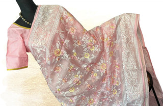 Soft pastel pink Kota embroidered saree with handwoven detailing and stitched blouse.