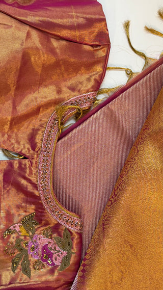 Pure silk rose gold Kanchi pattu saree with luxury bridal drape and hand embroidered blouse.