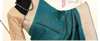 Elegant peacock green Tussar silk handloom saree with gold zari embroidered border and ready blouse