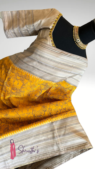 Indian bridal silk saree with Kalamkari painting, paired with readymade blouse, luxury wedding saree USA.