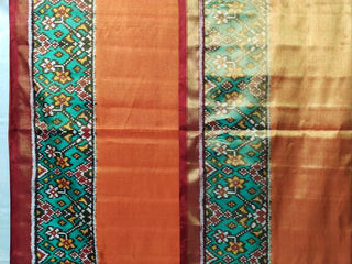 Orange Tissue twill Handloom pure silk Patan patola silk saree can be worn both sides two  pallu double threaded saree with stitched  blouse