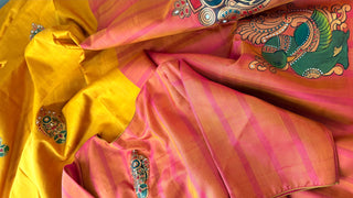 Hand painted Tanjore Kanchi Pattu pure silk saree in yellow with gold pallu