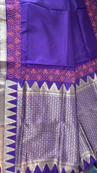 Handcrafted purple pure silk saree with detailed embroidery across border and pallu, perfect for festive celebrations