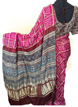 Elegant pink Bandhini pure silk saree with fall pico done and stitched Ajrakh blouse.