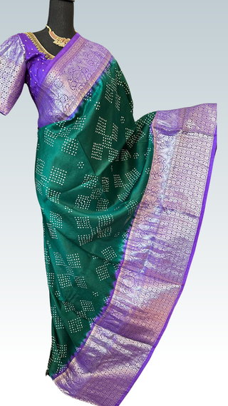 Handwoven Bandhej silk saree featuring intricate tie-dye patterns
