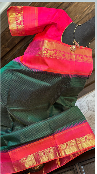 Handwoven Kanchipuram silk saree featuring intricate oosi weave and fine texture