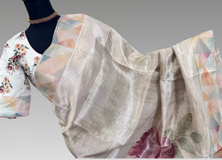 Designer organza saree with pastel border and elegant floral body print