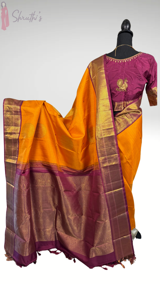 Yellow Kanjivaram silk saree with maroon zari border and embroidered stitched blouse for reception pellikuthuru USA.