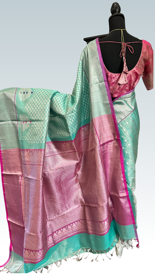 Handloom Venkatagiri tissue silk saree featuring silver zari weave and heavy pallu