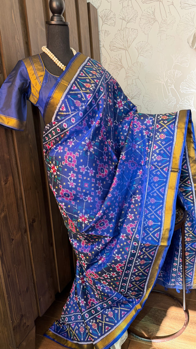 Handloom blue patola pure silk saree with intricate ikat design and elegant border