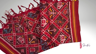 Handwoven Patan Patola red pure silk dupatta with elephant design and zari border.