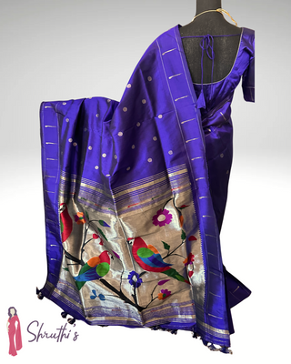 Handloom pure silk Paithani saree in silver zari with signature single muniya border, folded display